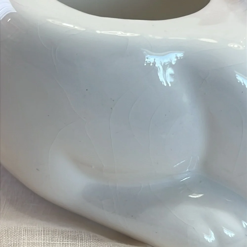 White Ceramic Cat-Shaped Planter with a Blue Scarf Adorned with Fish.